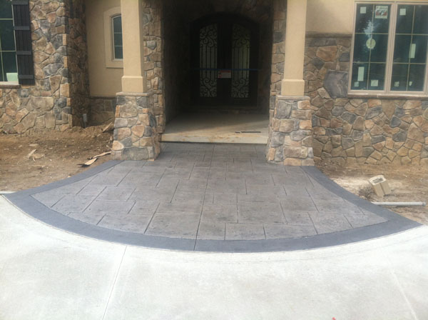 Stamped Entry with Stone Pillars